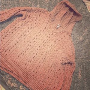 A comfy pink sweater